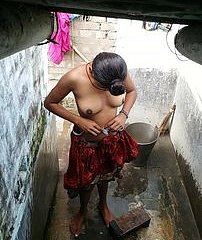 Indian woman upon rub-down the shower