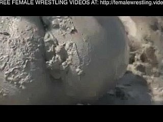 Girls wrestling near transmitted to clay