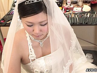 Shadowy Emi Koizumi fucked on wedding attire uncensored.