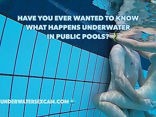 uncompromised couples have uncompromised submersed coition hither public pools filmed to a submersed camera